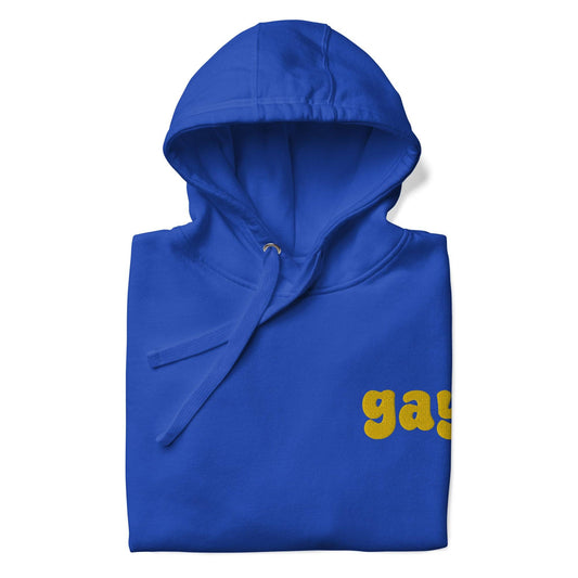 The Pridelity Gay Hoodie, featuring "gay" emblazoned in vibrant yellow text on the front, celebrates love and identity in a bold Team Royal color.