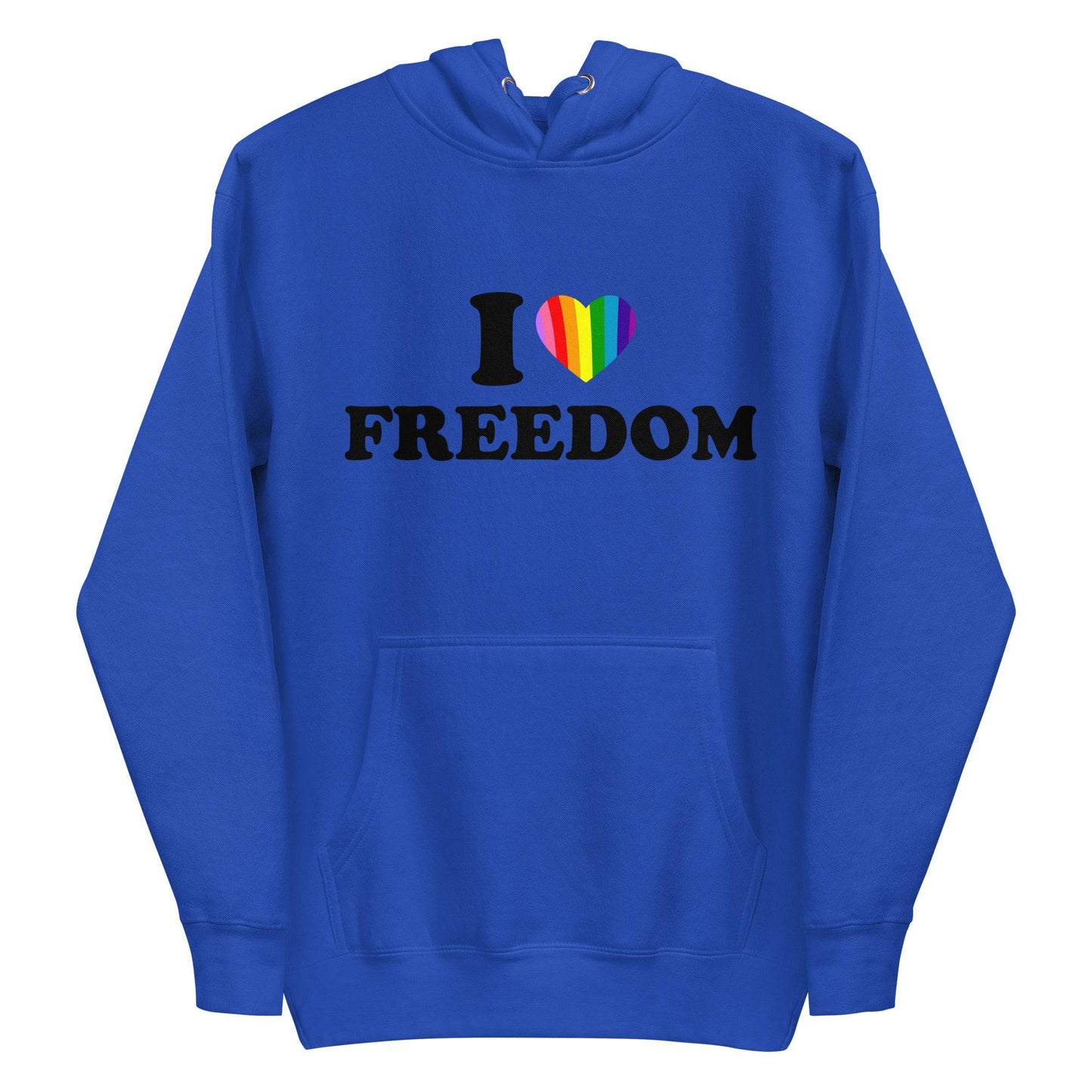 A neatly folded white "I Love Freedom Hoodie" by Pridelity showcases the phrase "I ♥ FREEDOM" accompanied by a rainbow heart, symbolizing diversity and inclusivity. The hoodie is arranged with drawstrings and the hood prominently displayed on top.