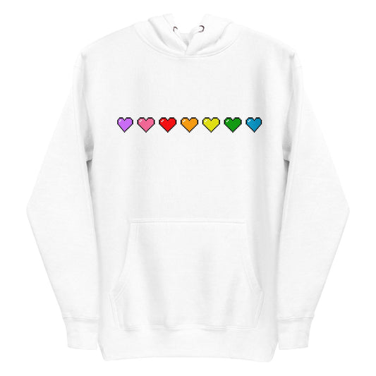 Introducing the Pixel Hearts Hoodie by Pridelity: This white hoodie showcases a row of pixelated hearts in vibrant rainbow colors—purple, pink, red, orange, yellow, green, and blue—across the chest, capturing the lively essence of pride shirts. It is designed with a convenient front pocket and a drawstring hood for added style and comfort.
