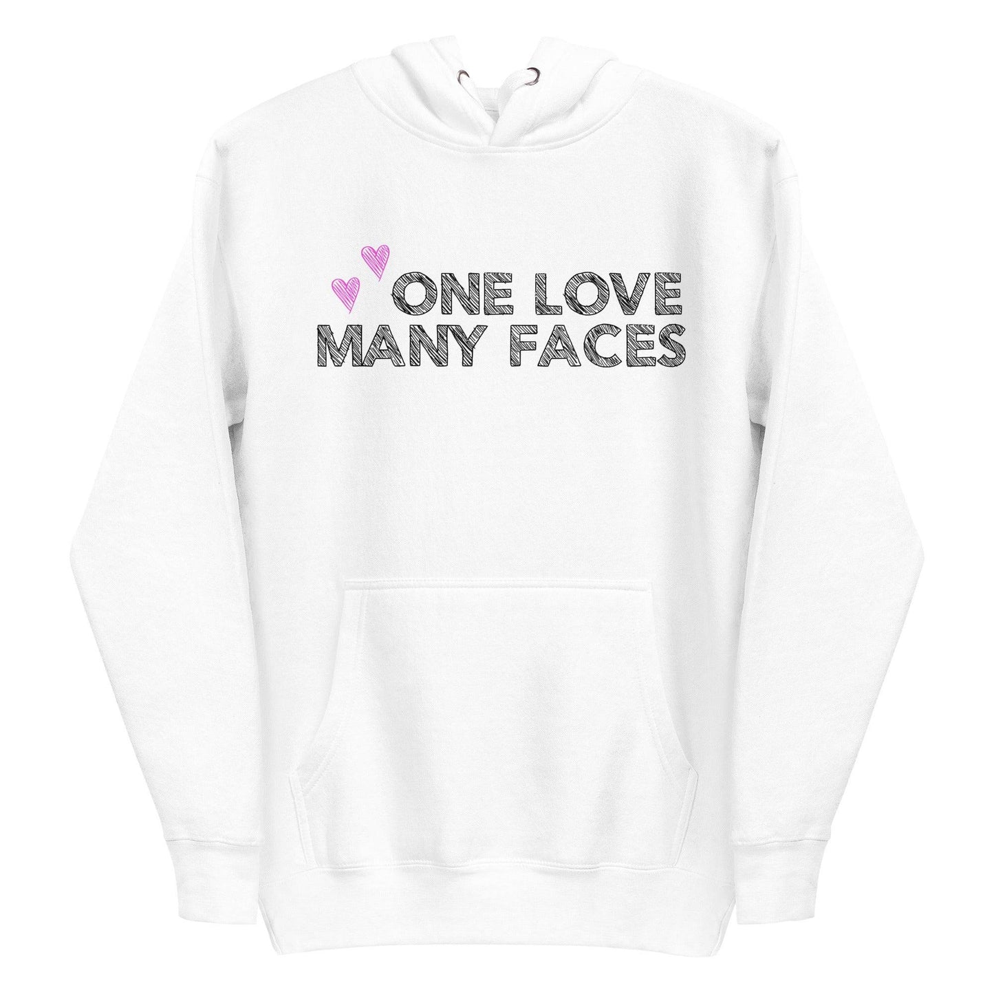 The One Love Hoodie by Pridelity is a folded pink sweatshirt, similar to pride shirts, featuring the bold black phrase "ONE LOVE MANY FACES" on the front. Two small pink hearts are positioned above the text on the left side, enhancing its charm.