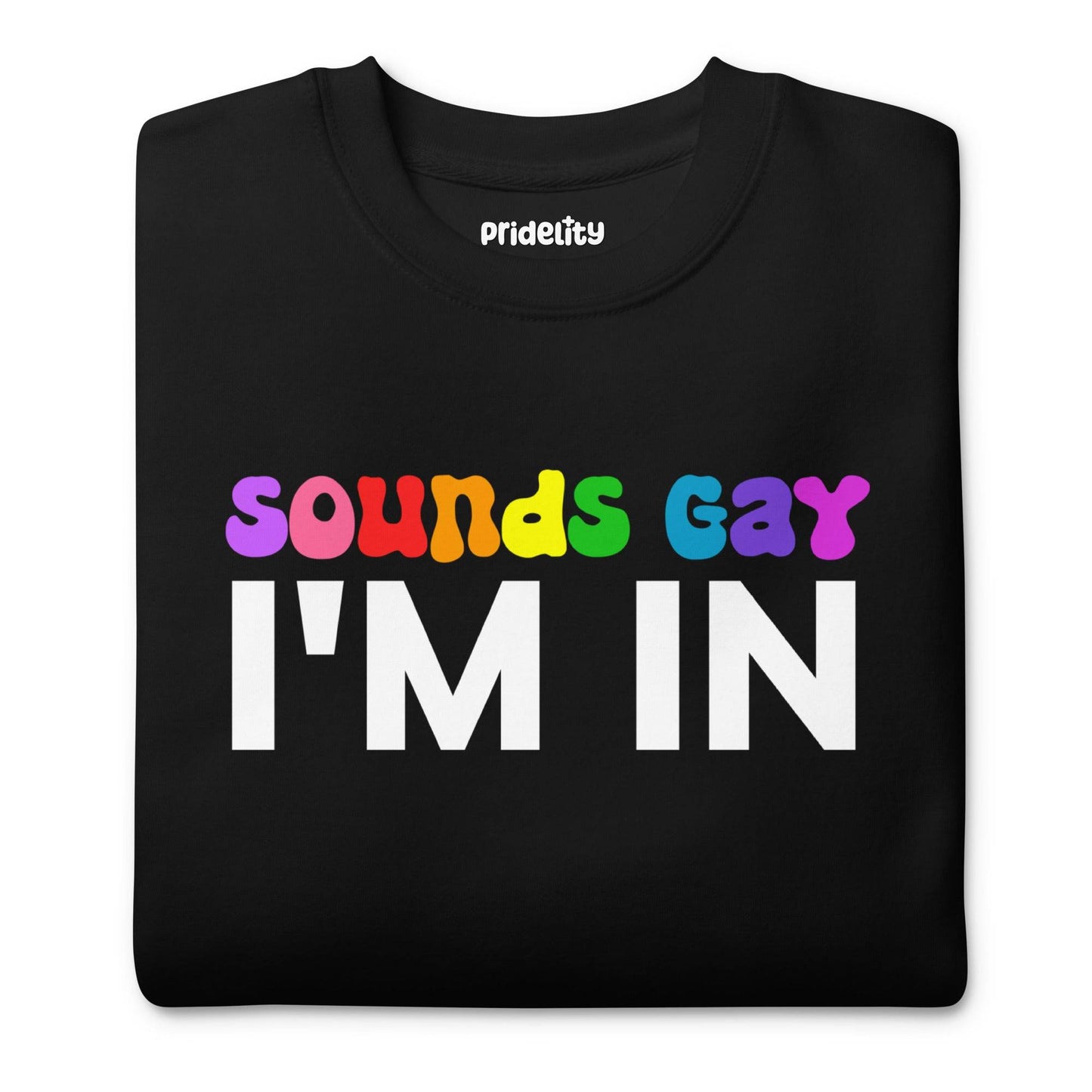 The Pridelity Sounds Gay Sweatshirt is a black top from our pride collection, showcasing the vibrant and playful text "SOUNDS GAY I'M IN.