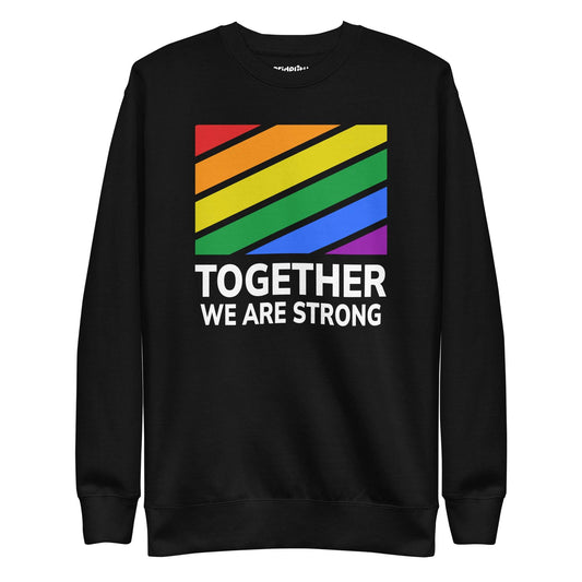 The black Together Sweatshirt from Pridelity's pride collection showcases a rainbow-colored design with diagonal stripes, beneath which the phrase "TOGETHER WE ARE STRONG" is displayed in white letters.