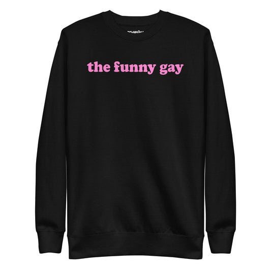 A standout piece for your pride collection, the Pridelity "The Funny Gay" Sweatshirt is a white top showcasing the phrase "the funny gay" in pink lowercase letters across the chest.