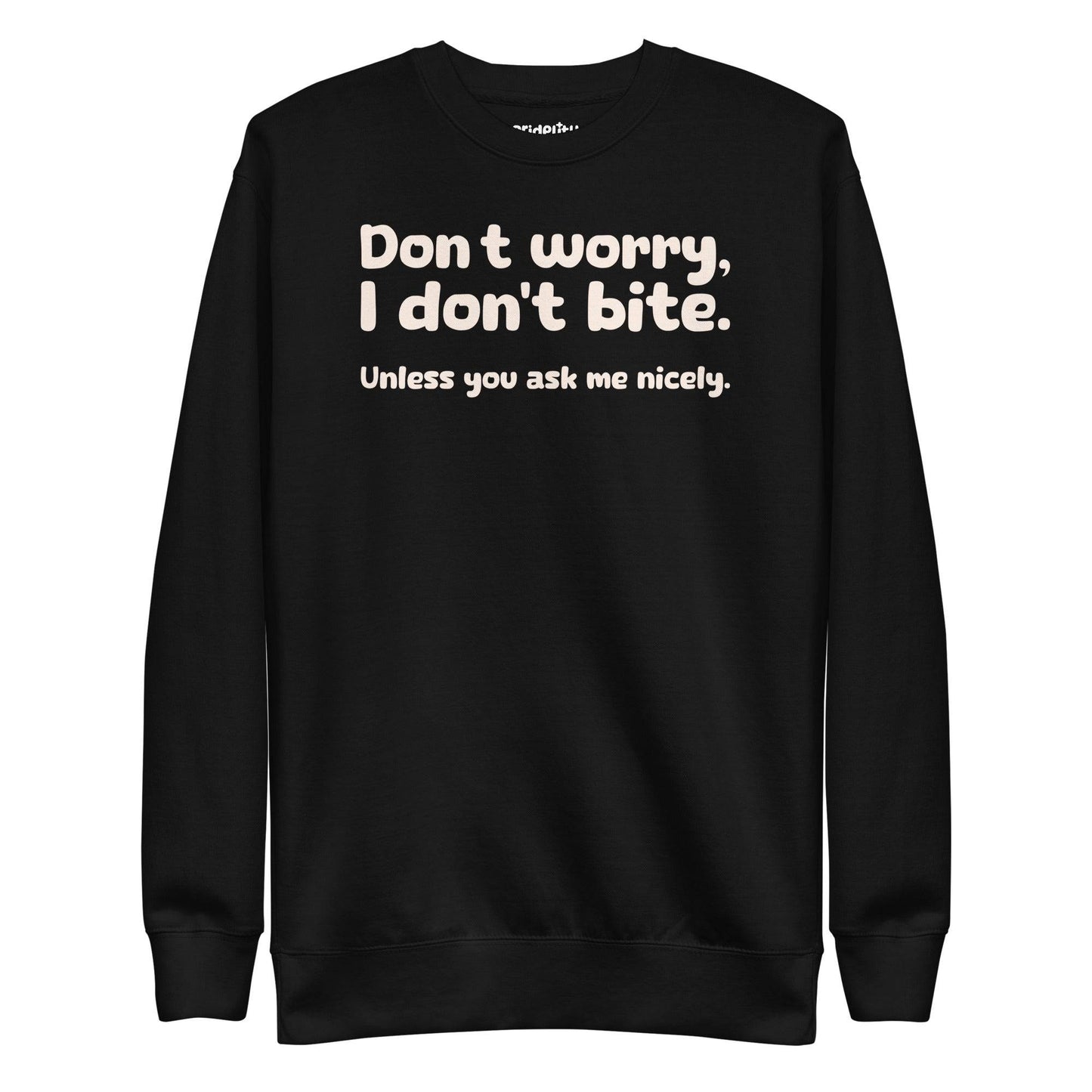 The "I Don't Bite Sweatshirt" by Pridelity, featuring the playful phrase "Don't worry, I don't bite. Unless you ask me nicely" in white text on a Team Royal background, adds a fun twist to your rainbow clothes collection.
