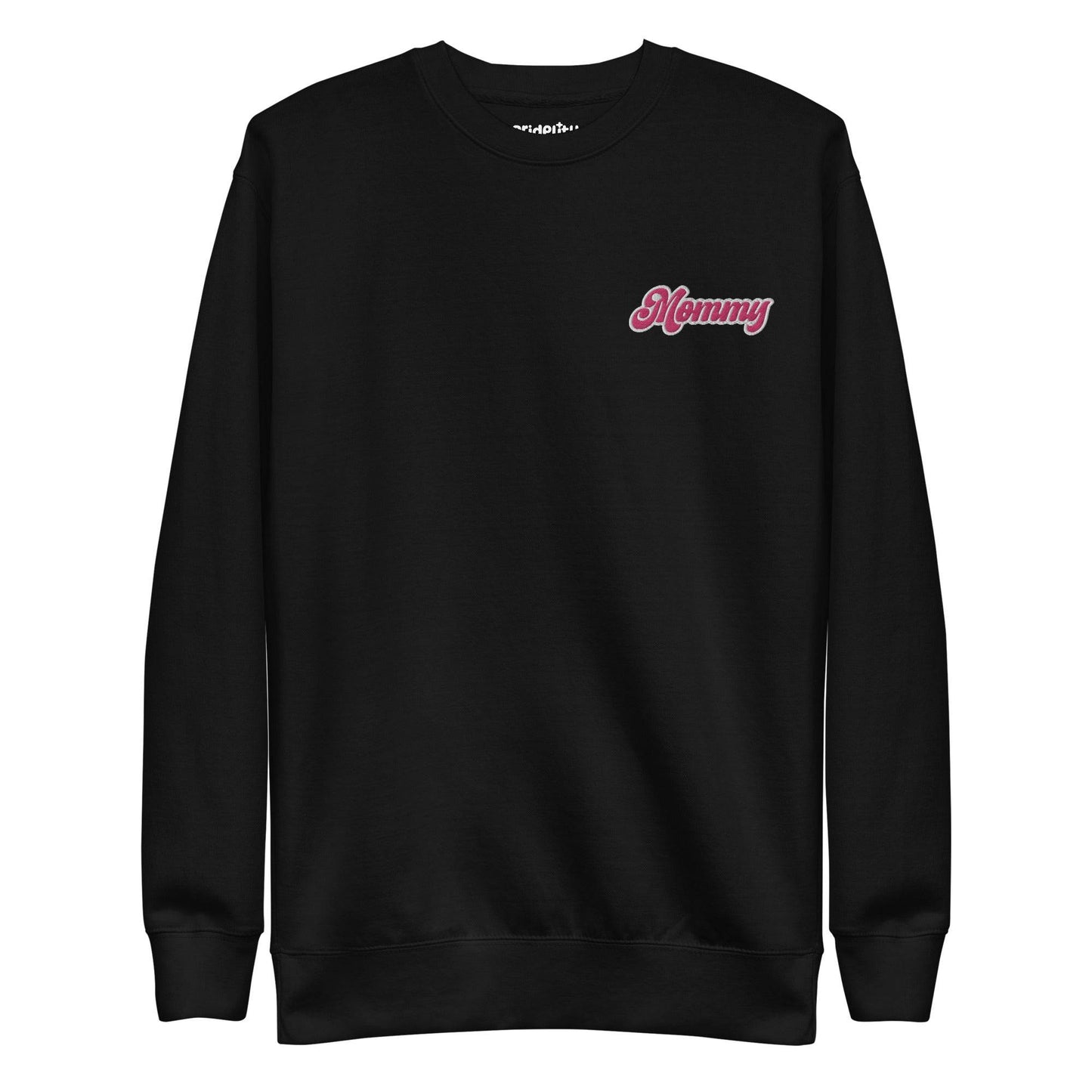 The Mommy Sweatshirt by Pridelity, part of our pride collection, showcases "Mommy" embroidered in pink on the left chest. With its long sleeves and round neckline, this black sweatshirt offers a simple, classic design that's perfect for showing pride in style.