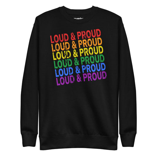 Introducing the Pridelity Loud & Proud Sweatshirt, a white garment adorned with "Loud & Proud" repeated five times in a striking rainbow gradient of red, orange, yellow, green, and blue—ideal for enthusiasts of bold and colorful fashion.