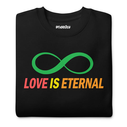 Introducing the "Love Is Eternal Sweatshirt" by Pridelity: a striking black sweatshirt featuring a green infinity symbol above the phrase "LOVE IS ETERNAL," artistically rendered in a captivating gradient blend from pink to orange. This standout piece captures the essence of rainbow-inspired fashion, celebrating infinite love and vivid self-expression.