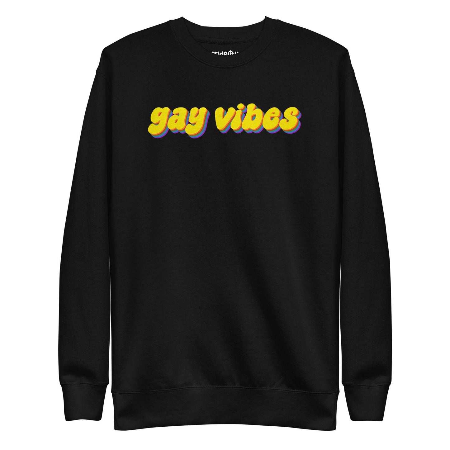 A dusty rose sweatshirt from Pridelity captures the essence of rainbow clothes style with the bold phrase "gay vibes" in yellow letters accented by purple shadows. Complementing this vibrant message, a small white "pridelity" logo is showcased above.