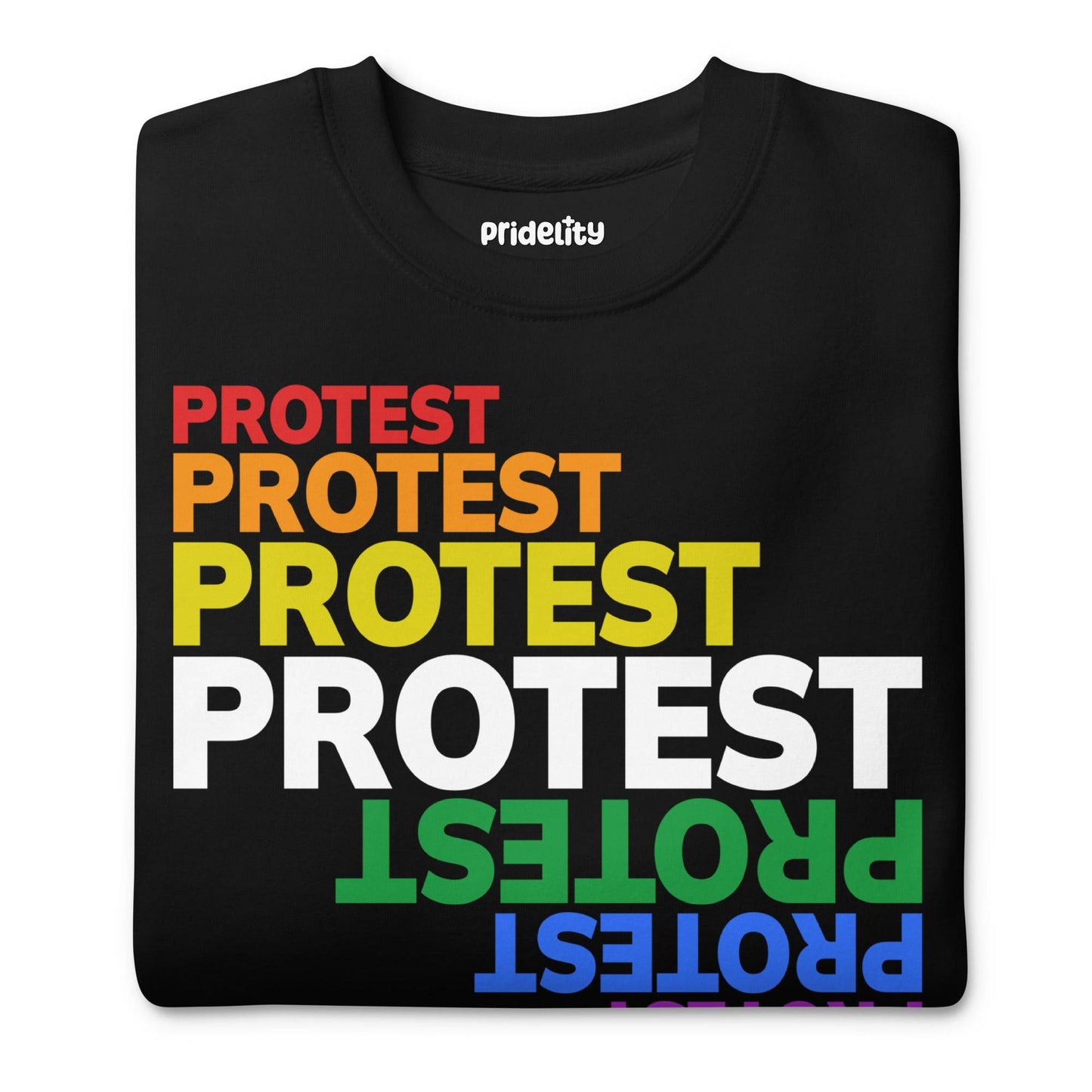The Pridelity Protest Sweatshirt from the pride collection is a black sweatshirt that showcases "PROTEST" in a vibrant descending stack of colors: red, orange, yellow, white, green, and blue. Each instance of the word is mirrored upside down below it, making for a striking pride outfit.