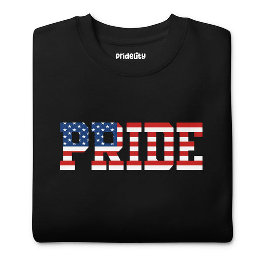 The American Pride Sweatshirt by Pridelity showcases "PRIDE" in an American flag pattern on the chest, featuring stars and stripes that reflect the essence of the USA flag. This bold and colorful design creates a striking contrast against the black fabric.