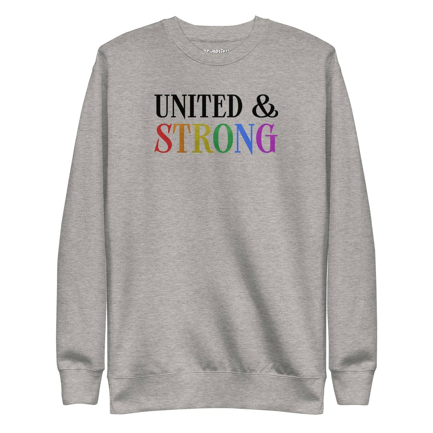 Introducing the Pridelity United & Strong Sweatshirt: a white garment from the pride collection featuring "UNITED & STRONG" on the front. The word "UNITED" is printed in black, while "STRONG" is designed with a striking rainbow gradient, creating a standout pride shirt.
