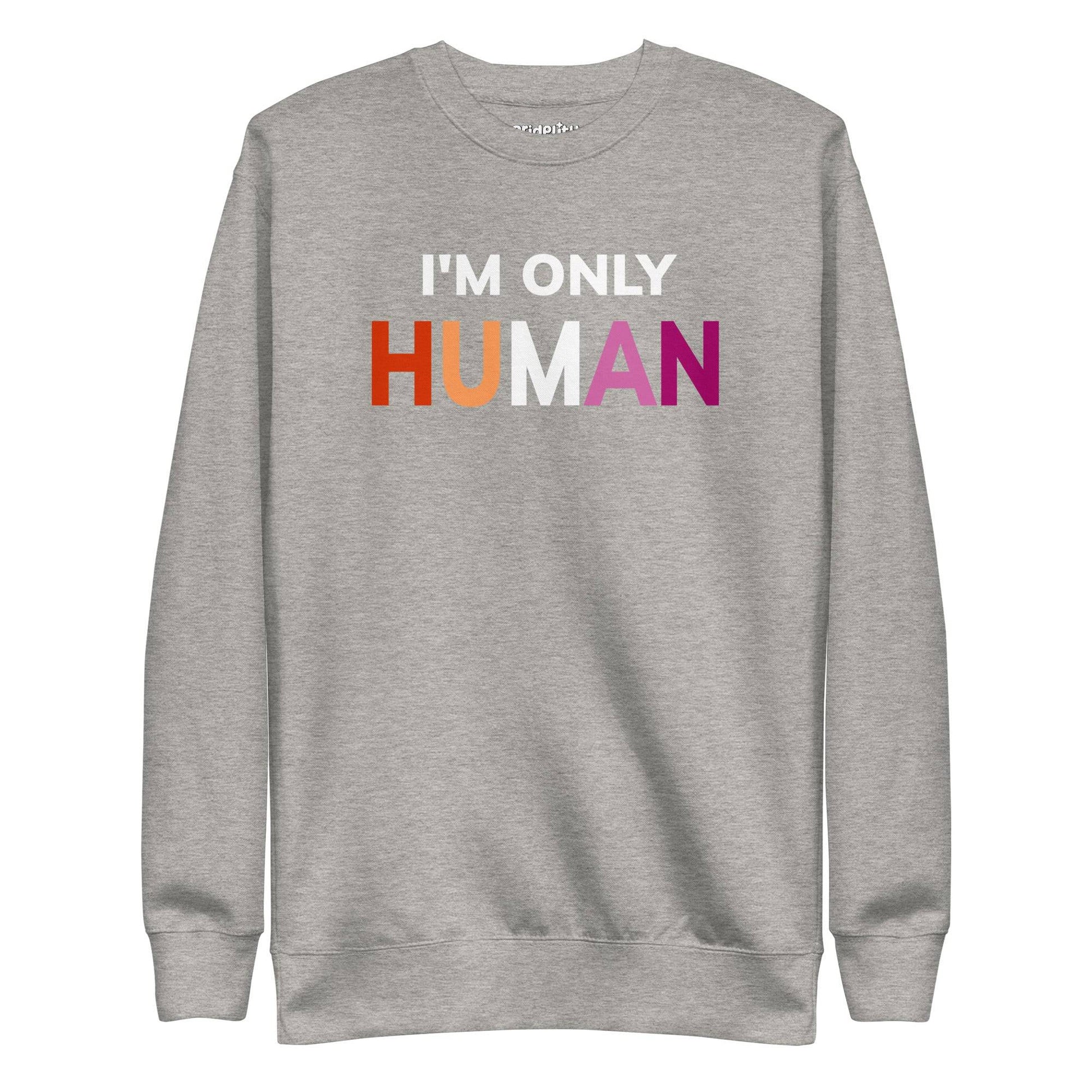 Introducing the "I'm Only Human" Sweatshirt by Pridelity—a black garment emblazoned with the phrase "I'M ONLY HUMAN" in striking white letters, enhanced with a lively rainbow color design across the front.