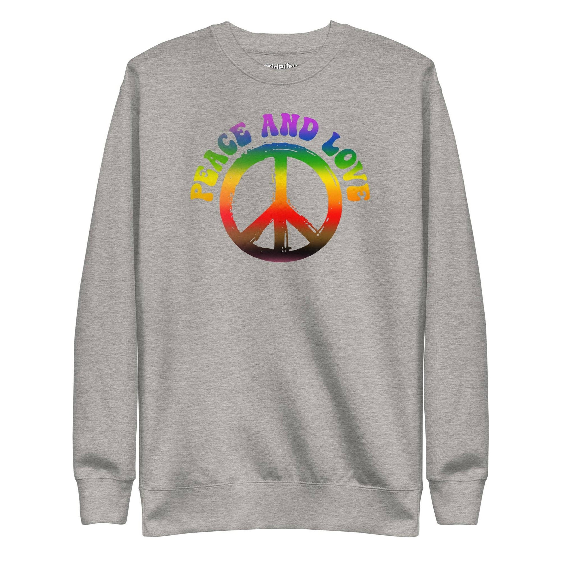This Pridelity "Peace & Love" Sweatshirt in white showcases a vibrant rainbow "Peace and Love" text over a large peace symbol with gradient colors.