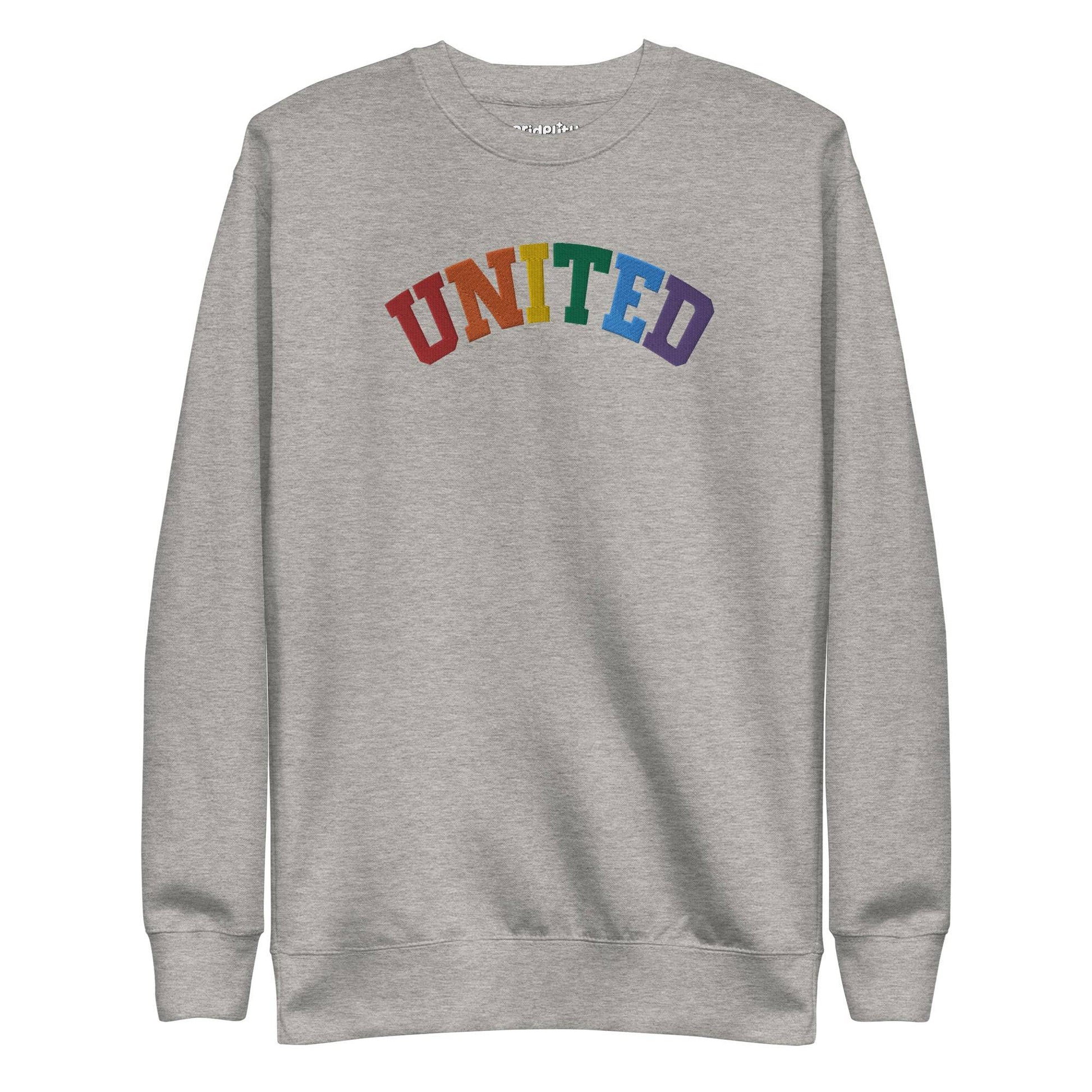 The United Sweatshirt from Pridelity's pride collection is a black design showcasing the word "UNITED" arced across the chest, with each letter in a different color to form a vibrant rainbow pattern. It features long sleeves and a crew neck, making it an ideal pride outfit for any occasion.
