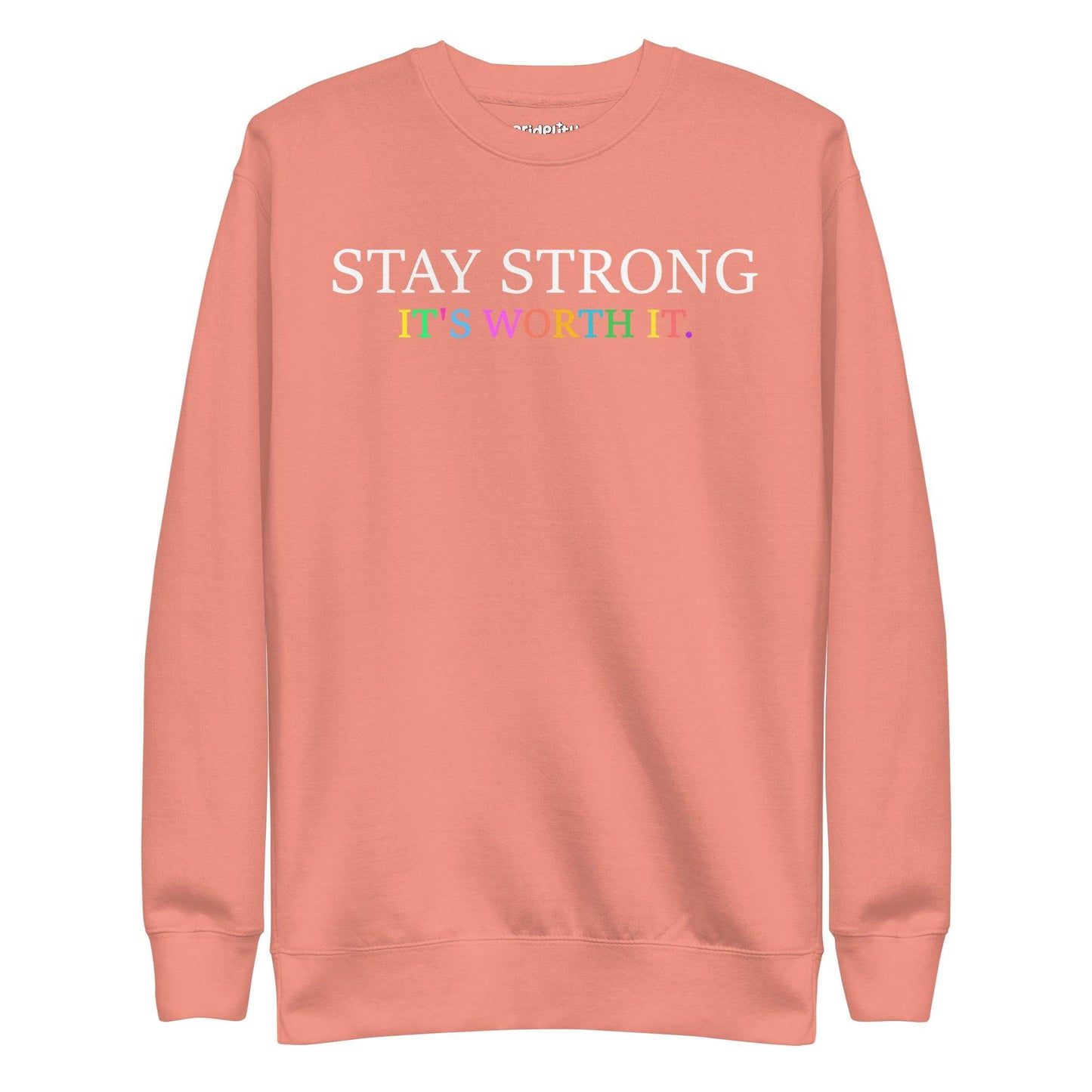 Introducing the "Stay Strong Sweatshirt" by Pridelity from their pride collection. This black sweatshirt features the powerful message "STAY STRONG IT'S WORTH IT." The words "STAY STRONG" stand out in bold white, while "IT'S WORTH IT." radiates in vibrant rainbow colors, making it an ideal choice for celebrating pride.