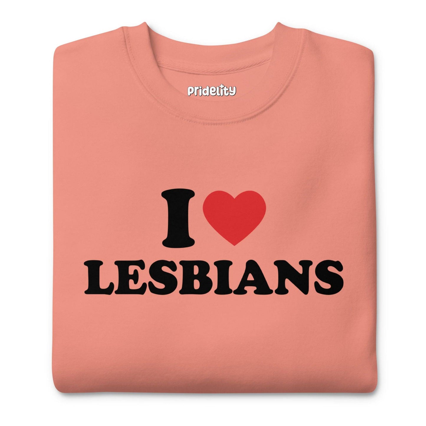 The I Love Lesbians Sweatshirt by Pridelity, in a dusty rose color, features "I ♥ LESBIANS" printed in bold black letters with a red heart symbol on the front, capturing the vibrant spirit of rainbow clothes.