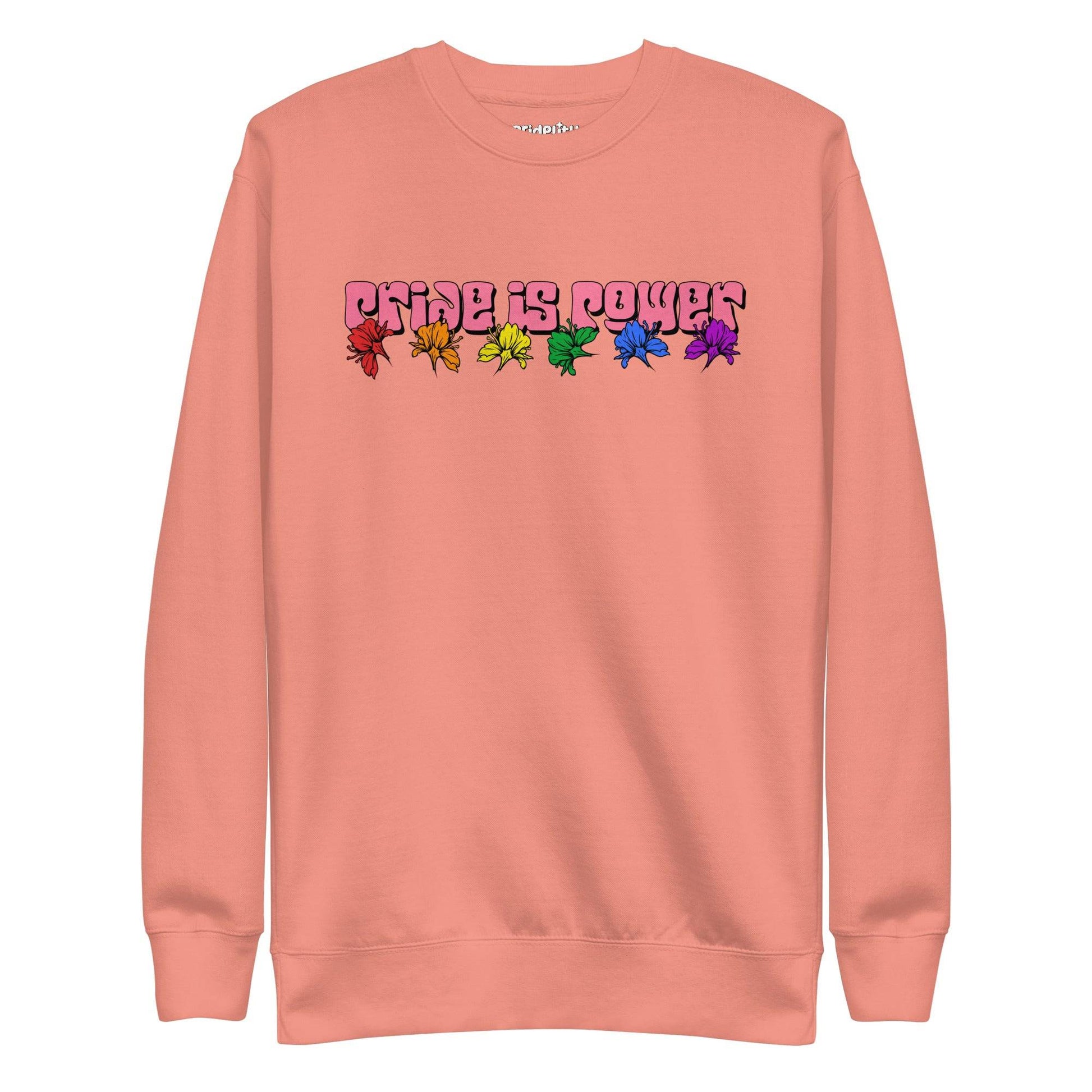 Introducing the "Pride Is Power Sweatshirt" by Pridelity, a black sweatshirt that features the phrase "PRIDE IS POWER" in eye-catching gradient letters. Below, six rainbow-colored butterflies symbolize diversity and pride, making it a standout piece from our pride collection.