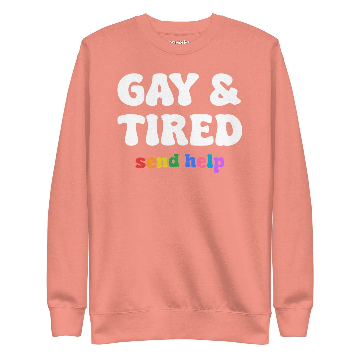 The "Gay & Tired Sweatshirt" by Pridelity is a black sweatshirt that displays bold white text saying "GAY & TIRED" along with colorful, rainbow-hued text below that reads "send help.