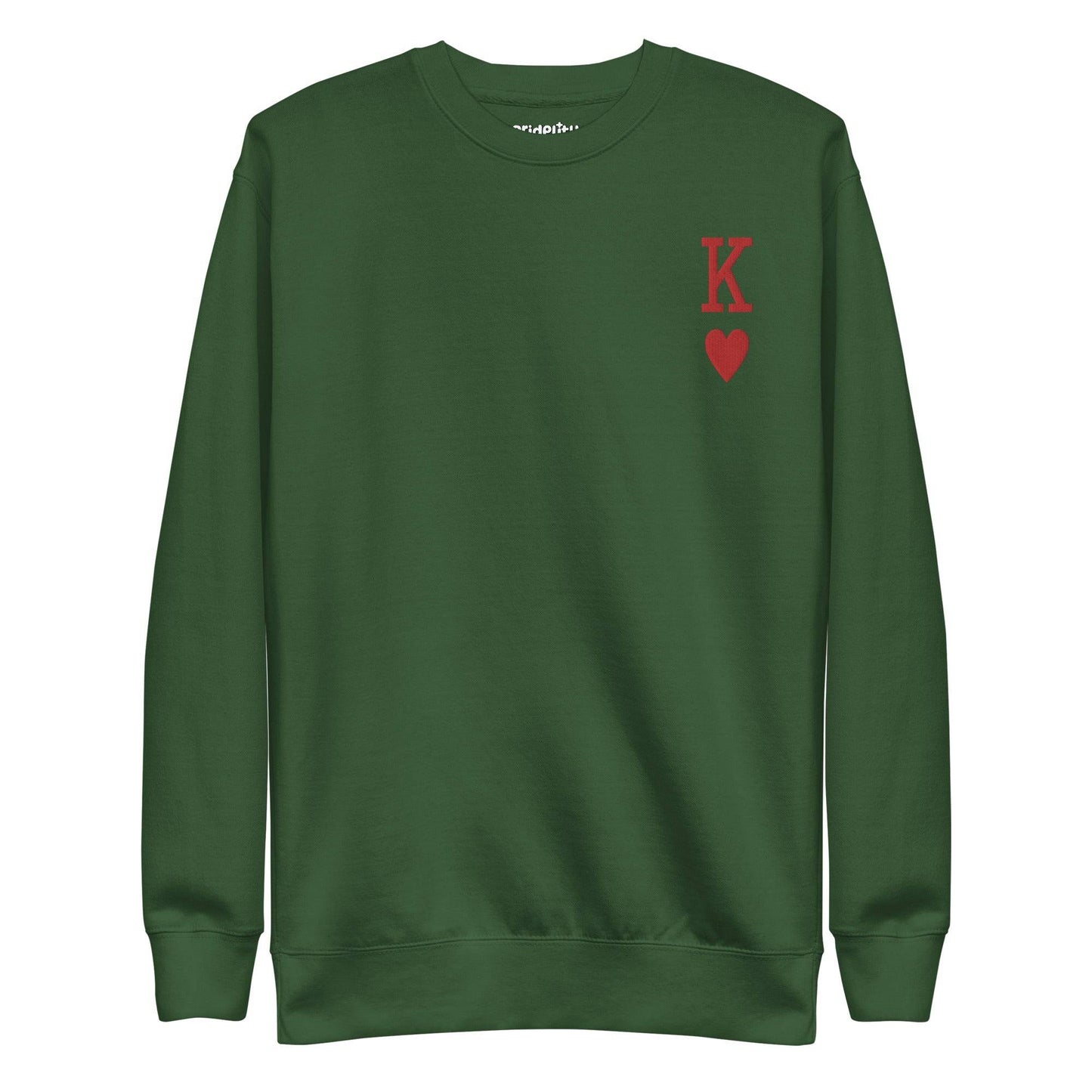 Introducing the King of Hearts Sweatshirt by Pridelity: This black sweatshirt features a distinctive red "K" with a red heart symbol positioned on the upper left side of the chest, making it an ideal companion for your rainbow-colored attire to enhance your stylish ensemble with a vibrant touch.