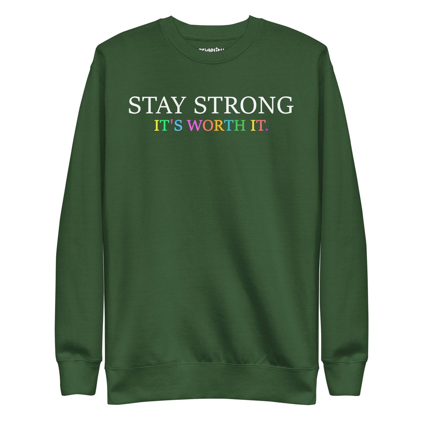 Introducing the "Stay Strong Sweatshirt" by Pridelity from their pride collection. This black sweatshirt features the powerful message "STAY STRONG IT'S WORTH IT." The words "STAY STRONG" stand out in bold white, while "IT'S WORTH IT." radiates in vibrant rainbow colors, making it an ideal choice for celebrating pride.
