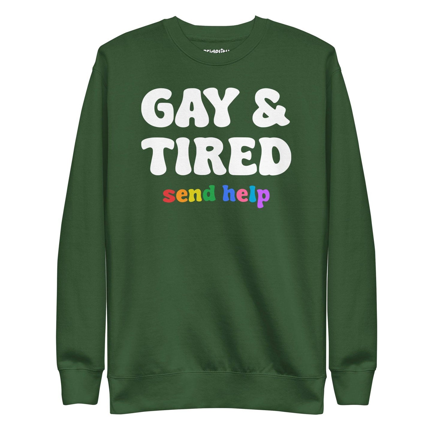The "Gay & Tired Sweatshirt" by Pridelity is a black sweatshirt that displays bold white text saying "GAY & TIRED" along with colorful, rainbow-hued text below that reads "send help.