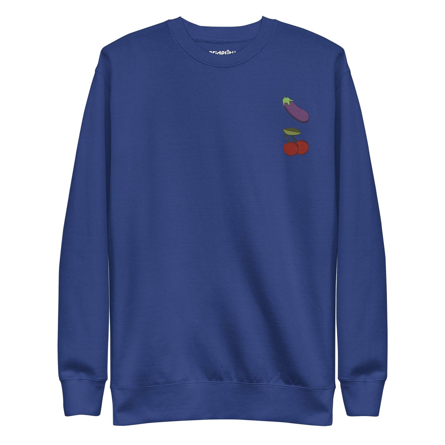 Check out the "Yummy Emojis Sweatshirt" by Pridelity in a dusty rose hue, showcasing small embroidered designs of an eggplant and cherries on the upper left side. This sweatshirt, from our exclusive pride collection, features a classic crew neck and long sleeves, making it perfect for any pride ensemble.