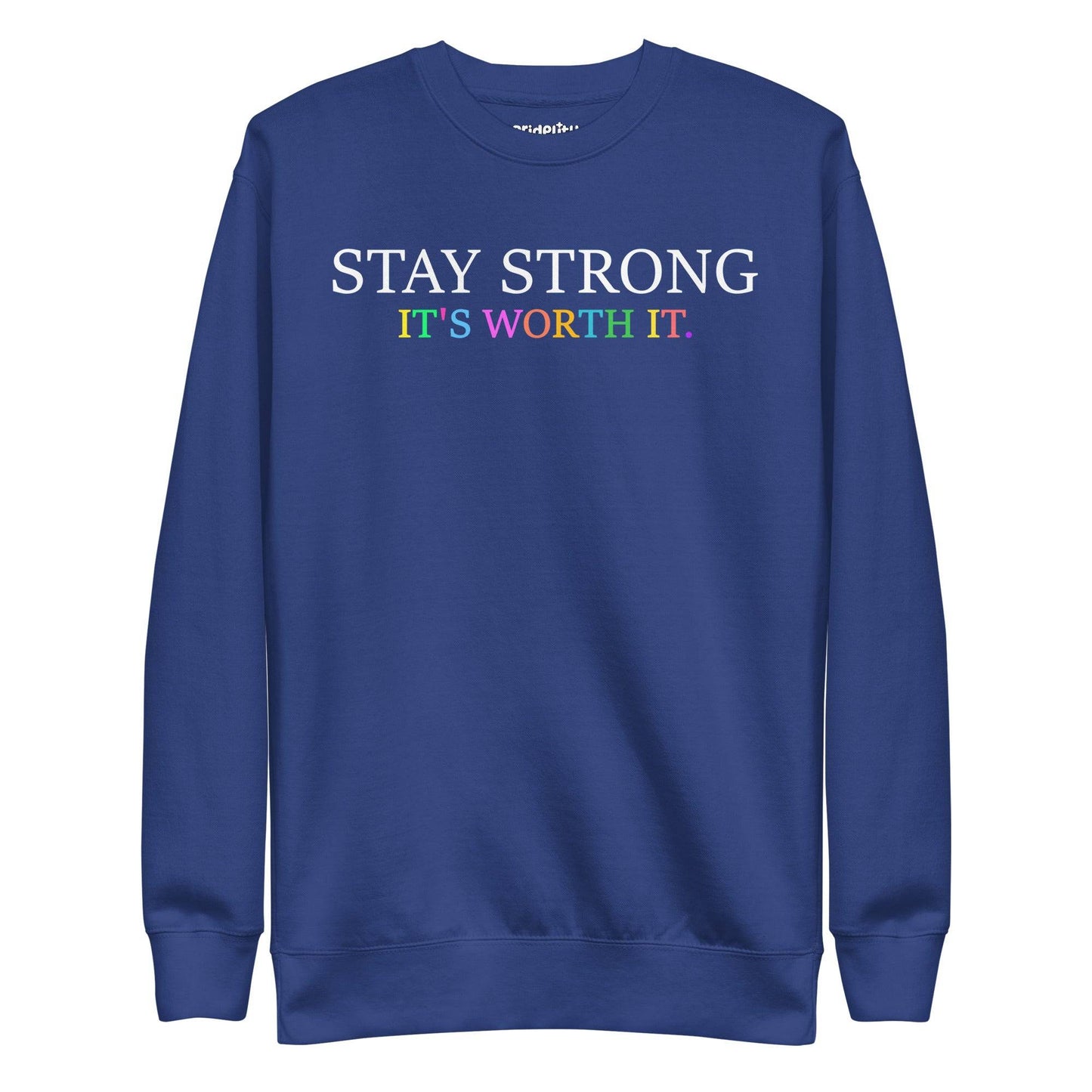Introducing the "Stay Strong Sweatshirt" by Pridelity from their pride collection. This black sweatshirt features the powerful message "STAY STRONG IT'S WORTH IT." The words "STAY STRONG" stand out in bold white, while "IT'S WORTH IT." radiates in vibrant rainbow colors, making it an ideal choice for celebrating pride.