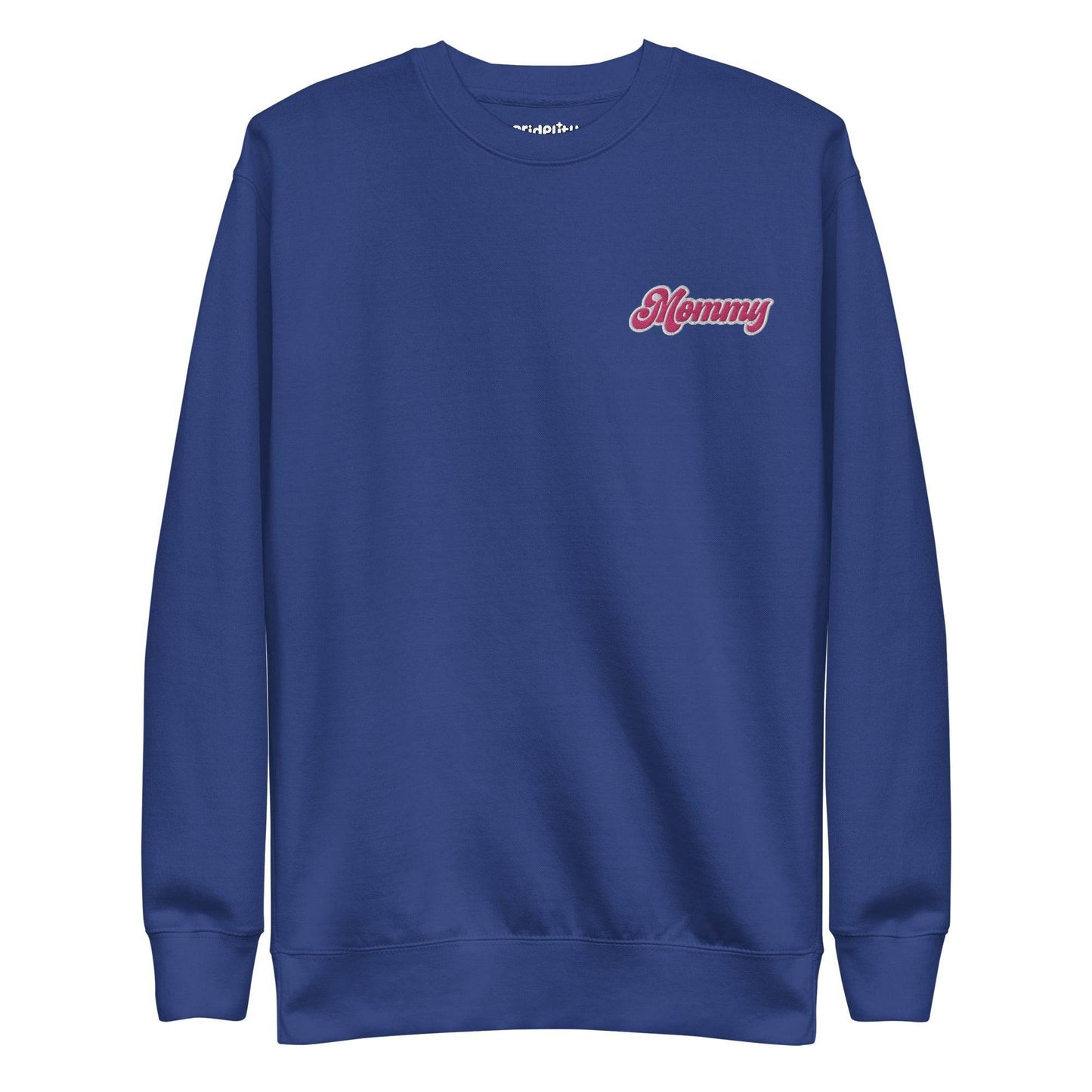 The Mommy Sweatshirt by Pridelity, part of our pride collection, showcases "Mommy" embroidered in pink on the left chest. With its long sleeves and round neckline, this black sweatshirt offers a simple, classic design that's perfect for showing pride in style.