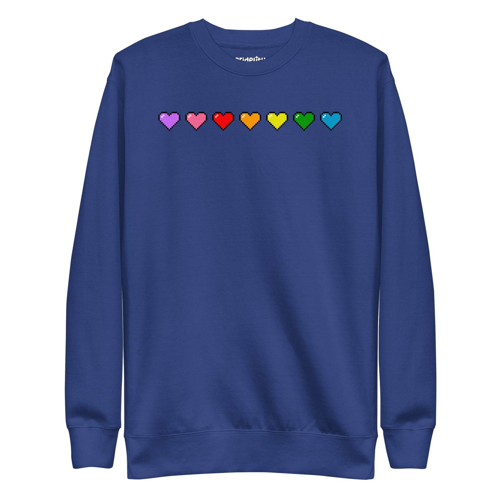 The Pixel Hearts Sweatshirt by Pridelity showcases a series of eight pixelated hearts in lively pride hues—purple, pink, red, orange, yellow, green, blue, and teal—across the chest on a carbon grey backdrop.