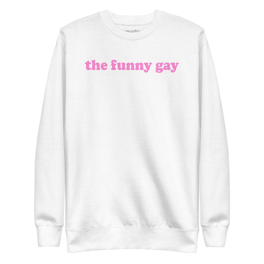 A standout piece for your pride collection, the Pridelity "The Funny Gay" Sweatshirt is a white top showcasing the phrase "the funny gay" in pink lowercase letters across the chest.