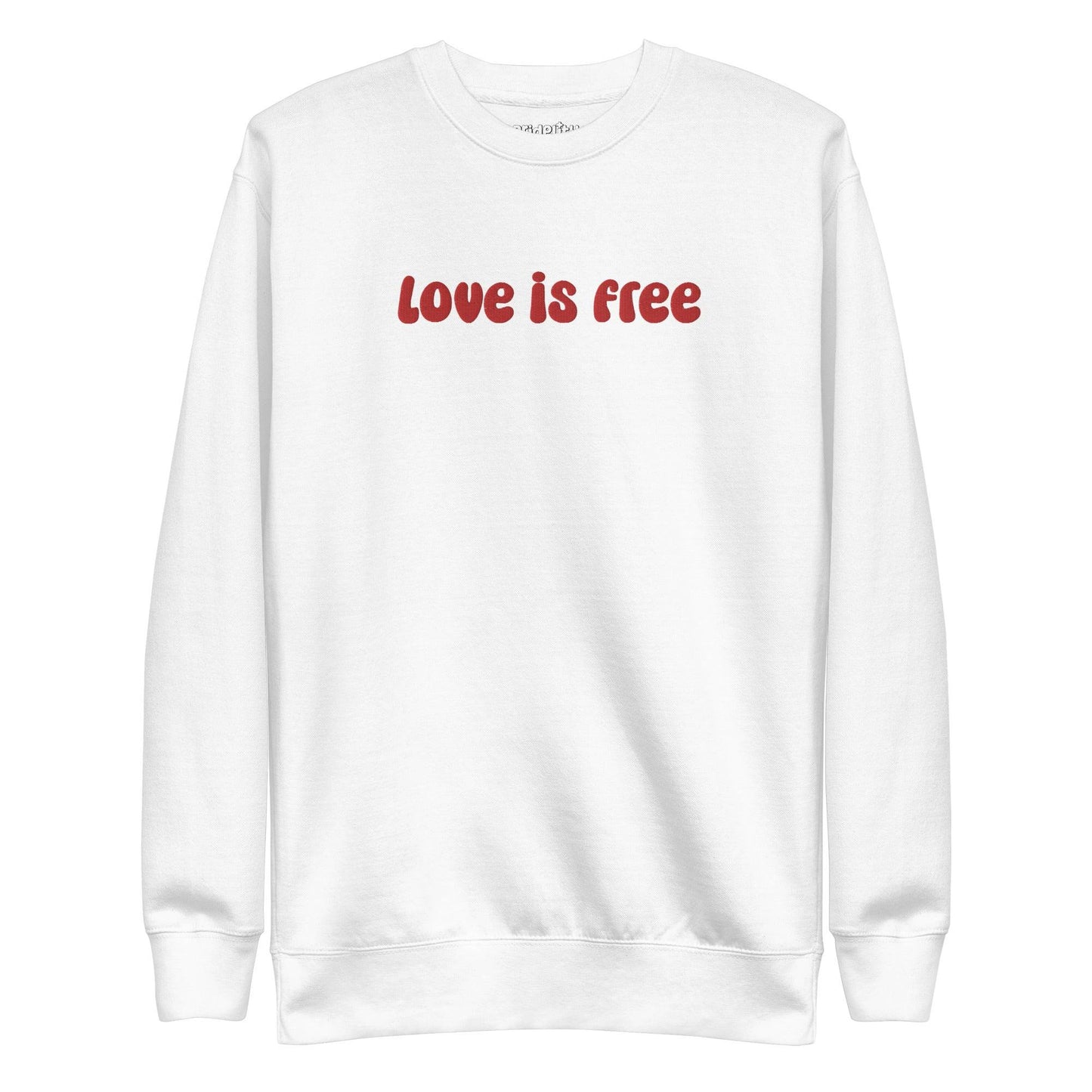 The Love Is Free Sweatshirt by Pridelity is a white sweatshirt with "love is free" boldly displayed in red letters across the chest, capturing the vibrant and inclusive essence of rainbow clothes.