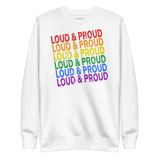 Introducing the Pridelity Loud & Proud Sweatshirt, a white garment adorned with "Loud & Proud" repeated five times in a striking rainbow gradient of red, orange, yellow, green, and blue—ideal for enthusiasts of bold and colorful fashion.