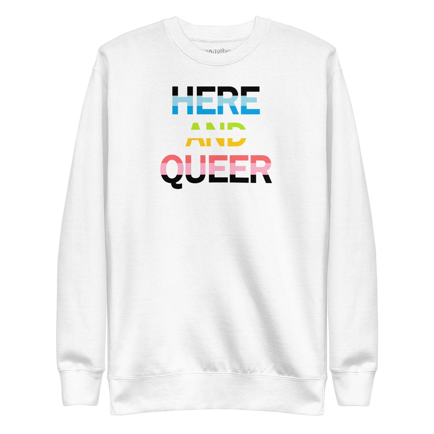 A "Here And Queer" sweatshirt by Pridelity, in a striking Team Royal shade, features a bold print and vibrant rainbow gradient design that elegantly represents LGBTQ+ pride.