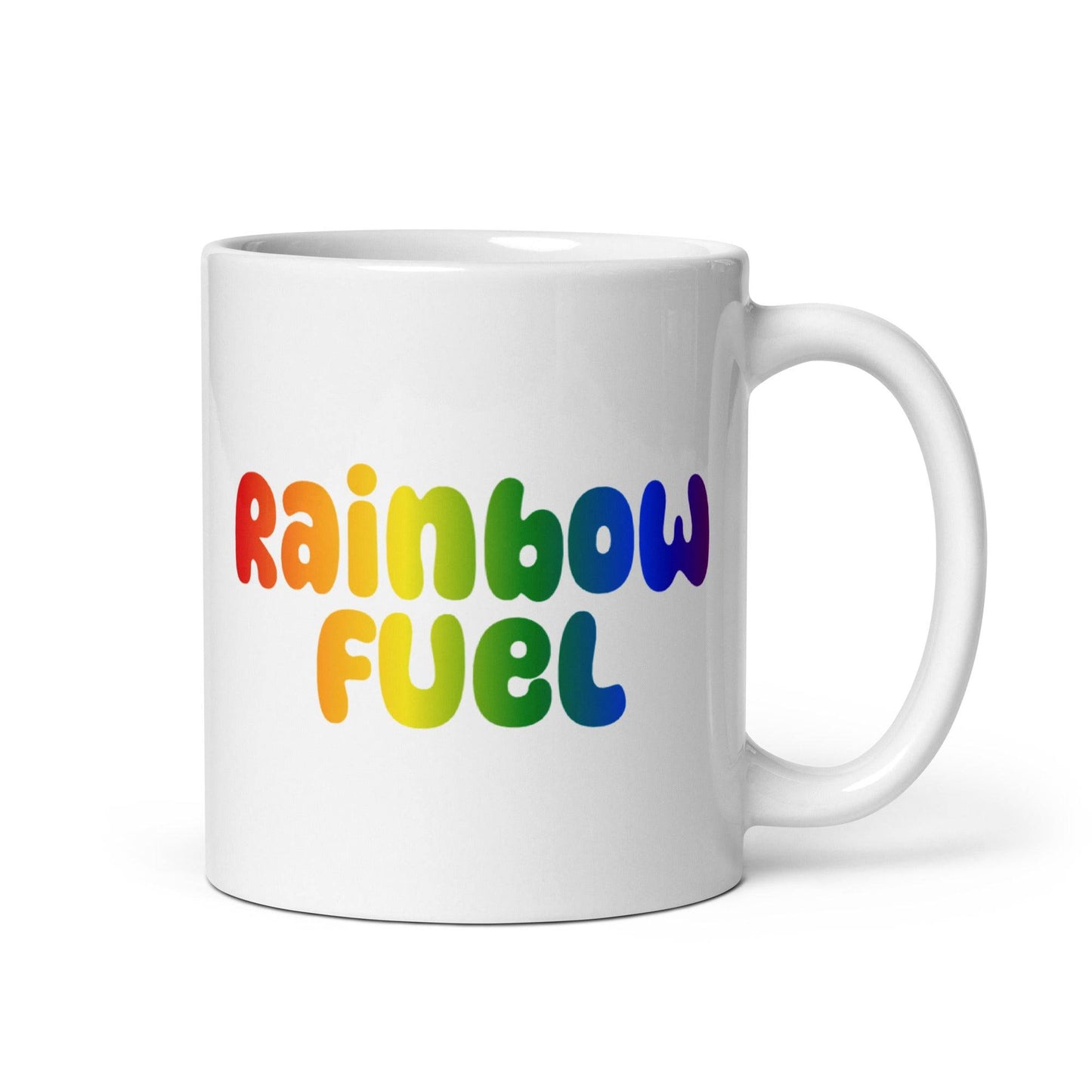 Introducing the Pridelity Rainbow Fuel Mug: a simple yet vibrant white mug featuring "Rainbow Fuel" in bold, colorful letters with a stunning rainbow gradient, as part of our Pride Collections 2025. The handle is conveniently placed on the right side.