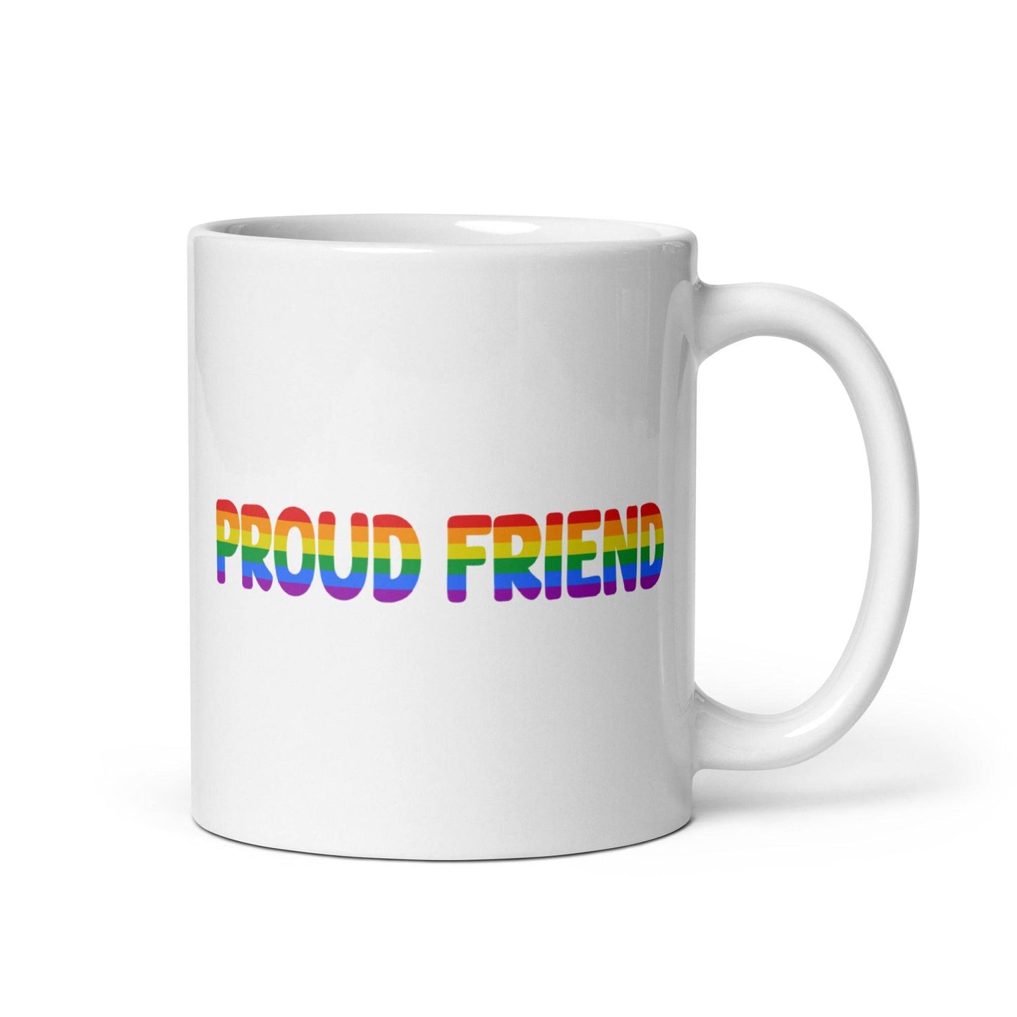 A white mug from Pridelity's Pride Collection 2025 features the words "Proud Friend" in bold, rainbow-colored letters.