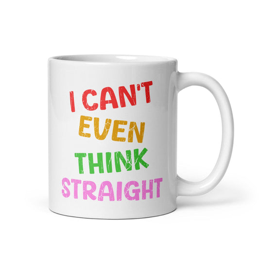 Introducing the "I Can't Even Think Straight" mug by Pridelity, a white mug featuring vibrant red, orange, yellow, green, and pink text. This standout piece is part of the best pride collections of 2025.