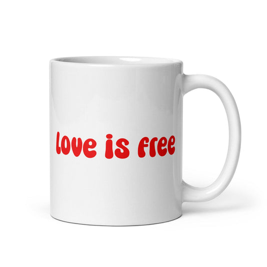 Introducing the "Love Is Free Mug" from Pridelity's Pride Collections 2025, this white mug showcases a simple design featuring the phrase "love is free" in bold red letters. Celebrating love in all its forms, it comes with a sturdy handle for everyday use.