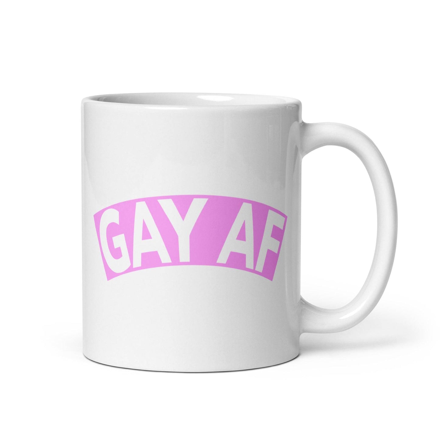 The Gay AF Mug by Pridelity is a white mug from the premier Pride Collections 2025, featuring "GAY AF" boldly centered in pink uppercase letters that dominate the design.