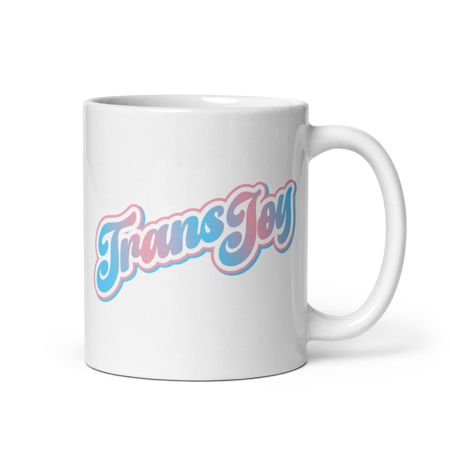 The "Trans Joy Mug" from Pridelity's Pride Collection 2025 features the text "Trans Joy" in blue and pink cursive letters with a shadow effect against a plain white background.