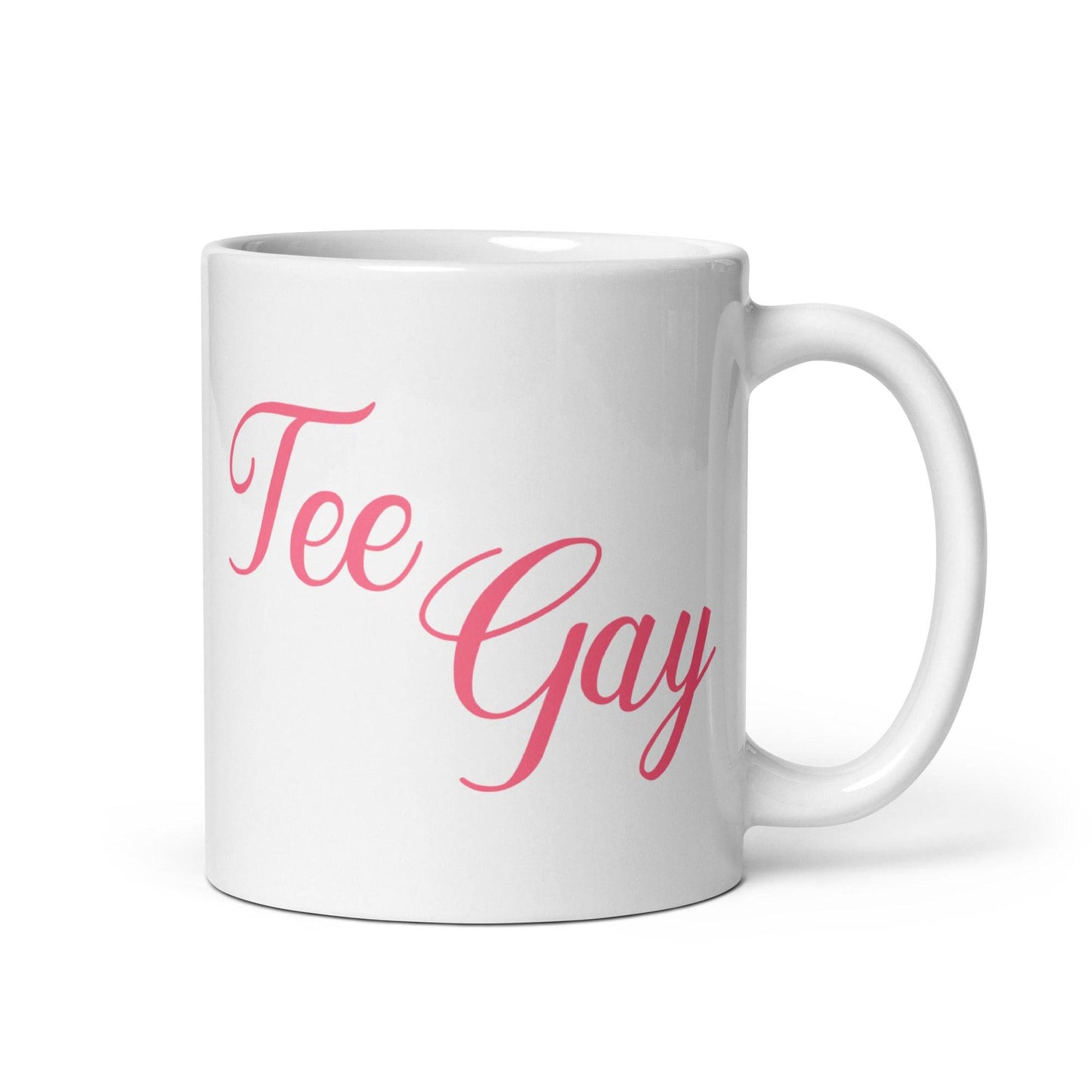 White ceramic mug with pink cursive text reading 'Tee Gay,' perfect for celebrating pride in style. Ideal for coffee or tea lovers.
