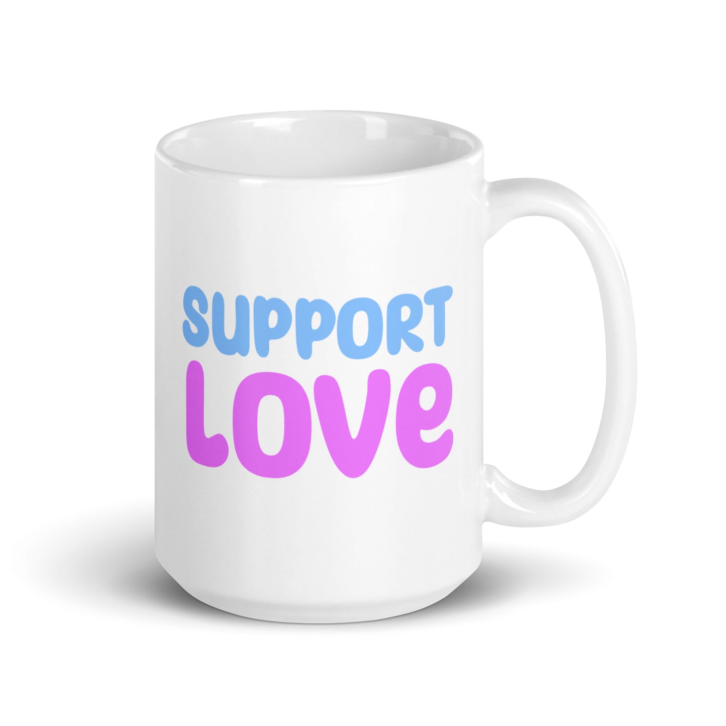 The Support Love Mug by Pridelity, from the Pride Collections 2025, showcases "SUPPORT LOVE" in blue and pink fonts on a white background, symbolizing a vibrant celebration of inclusivity.