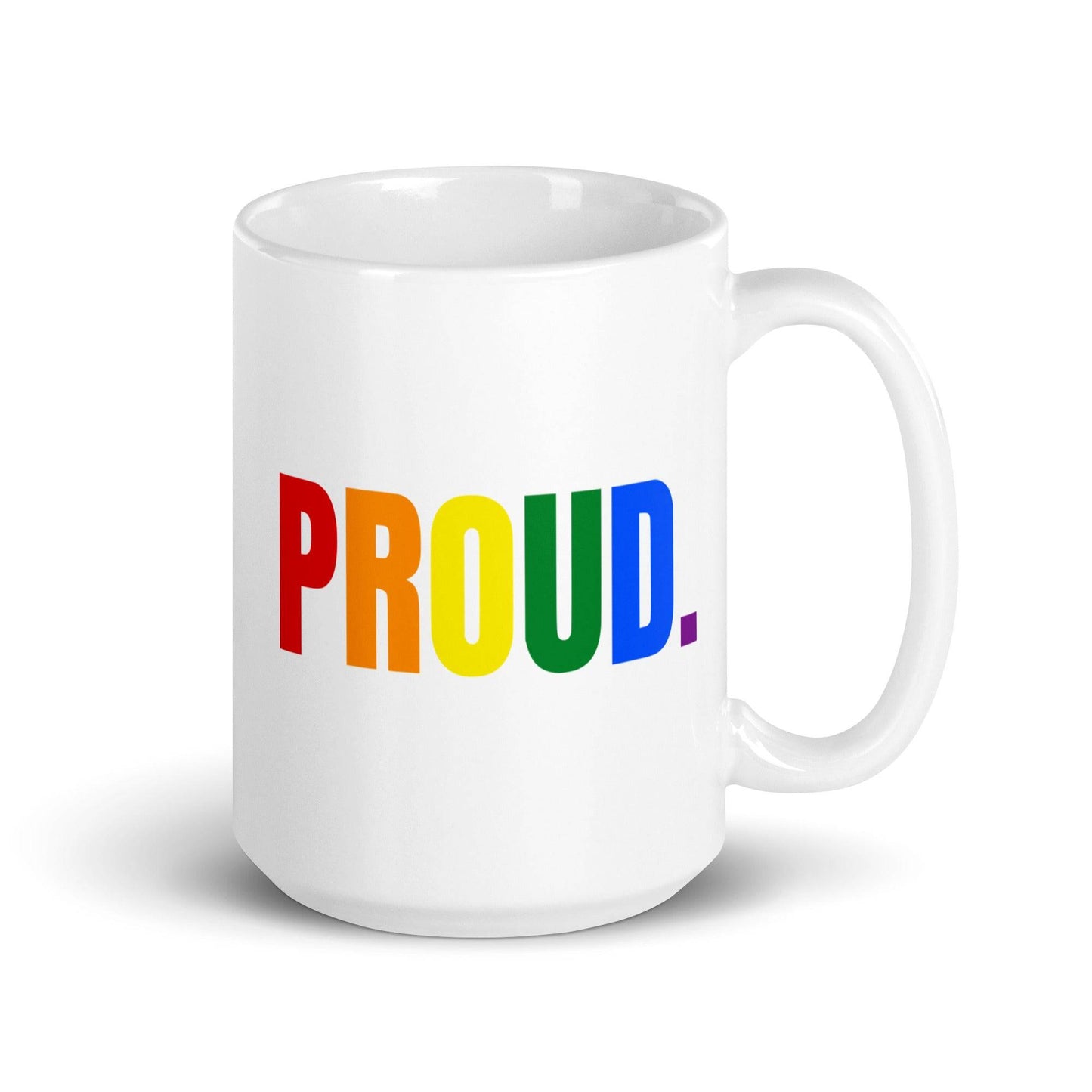 The Proud. Mug by Pridelity showcases the word "PROUD." in bold, rainbow-colored letters across the front of a white mug, perfectly capturing the essence of Pride Collections 2025. The lettering is centered and includes a period at the end.