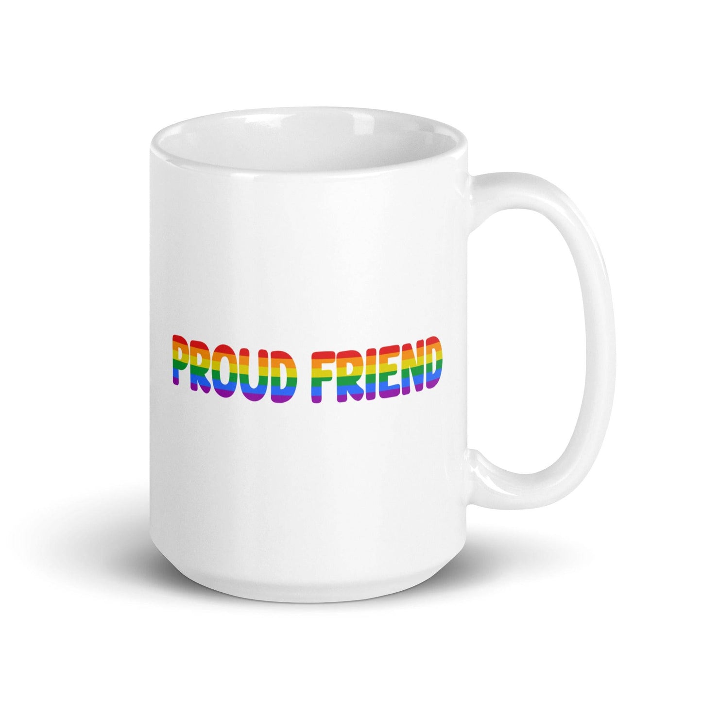 A white mug from Pridelity's Pride Collection 2025 features the words "Proud Friend" in bold, rainbow-colored letters.
