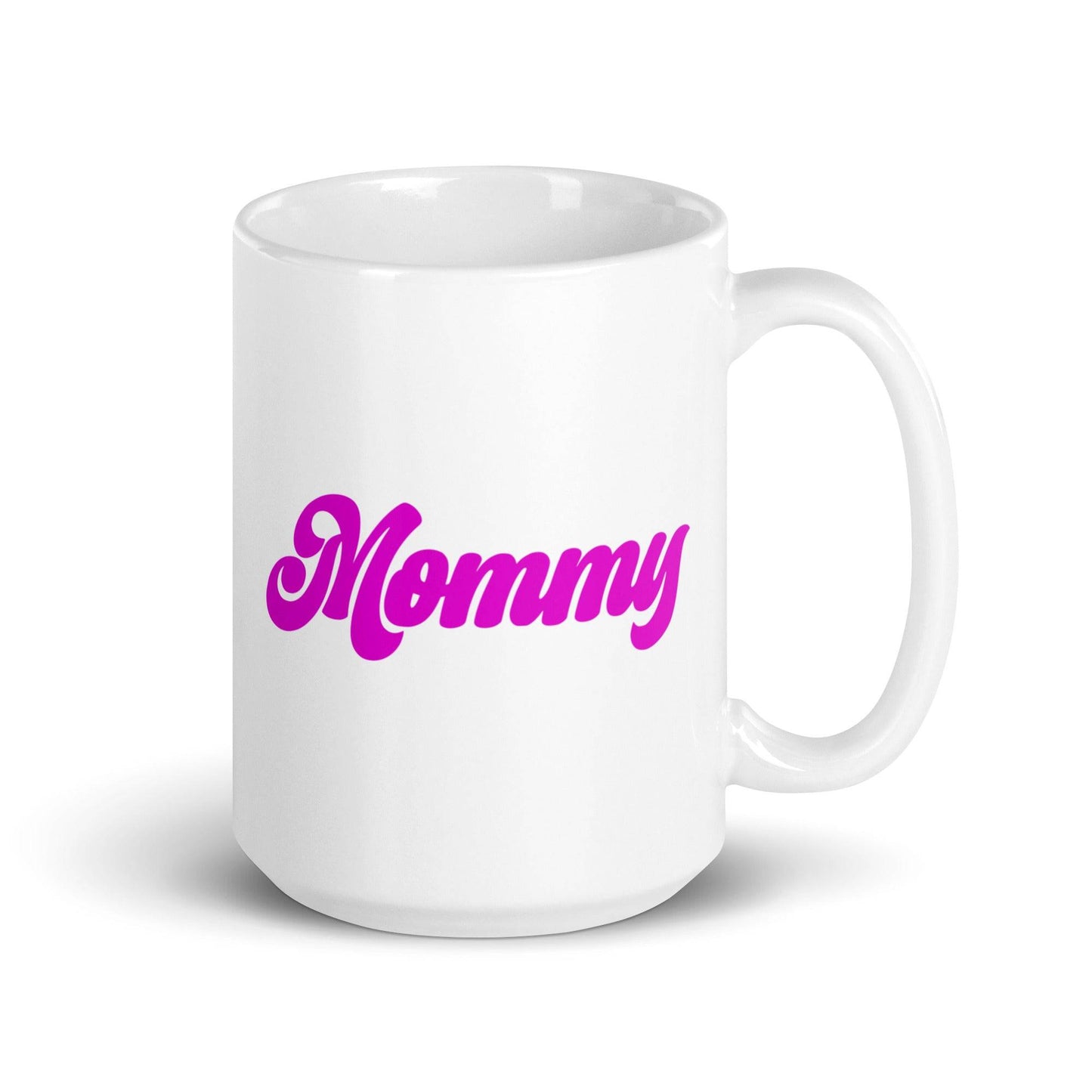 A Mommy Mug by Pridelity, part of the Pride Collections 2025, showcases "Mommy" printed in bold pink letters on a white ceramic mug.