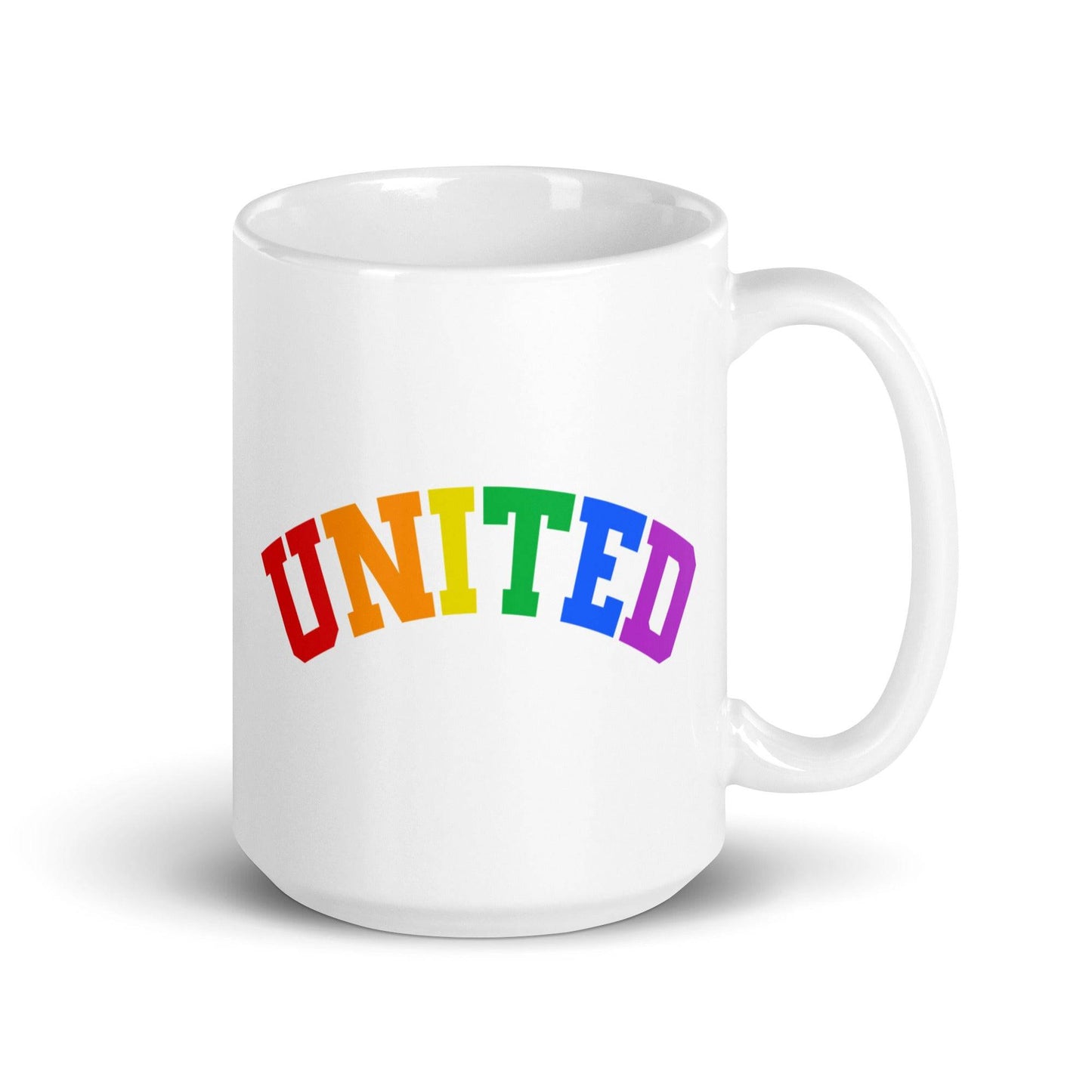 A mug from Pridelity's Pride Collection 2025, known as the United Mug, showcases the word "UNITED" in bold, rainbow-colored letters on a white background.