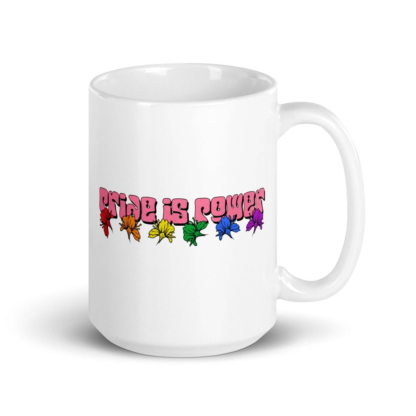 The Pride Is Power Mug from Pridelity's Pride Collections 2025 is a white mug adorned with the phrase "Pride Is Power" in bold pink letters, and features a vibrant row of rainbow-hued flowers beneath the text, symbolizing diversity and inclusivity.