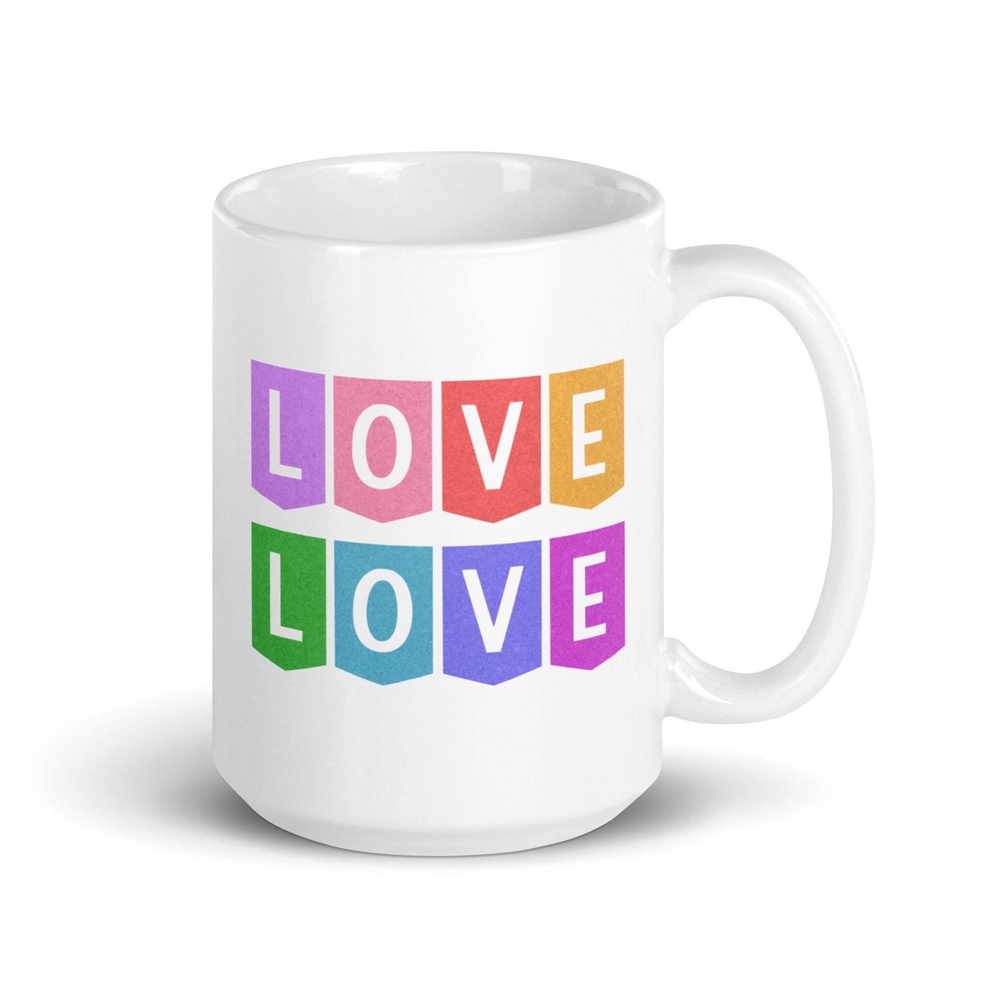 Introducing the Love Love Mug by Pridelity from our Pride Collections 2025, featuring a colorful design with "LOVE" displayed twice in bold capital letters. Each letter is placed on its own vibrant block of color, arranged in two cheerful rows.
