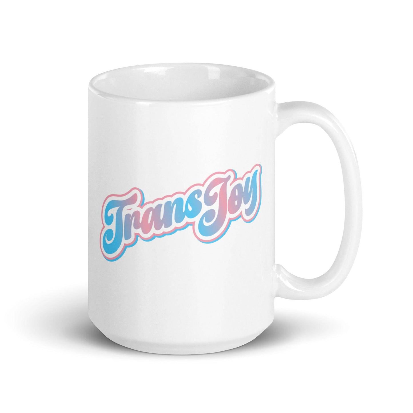 The "Trans Joy Mug" from Pridelity's Pride Collection 2025 features the text "Trans Joy" in blue and pink cursive letters with a shadow effect against a plain white background.