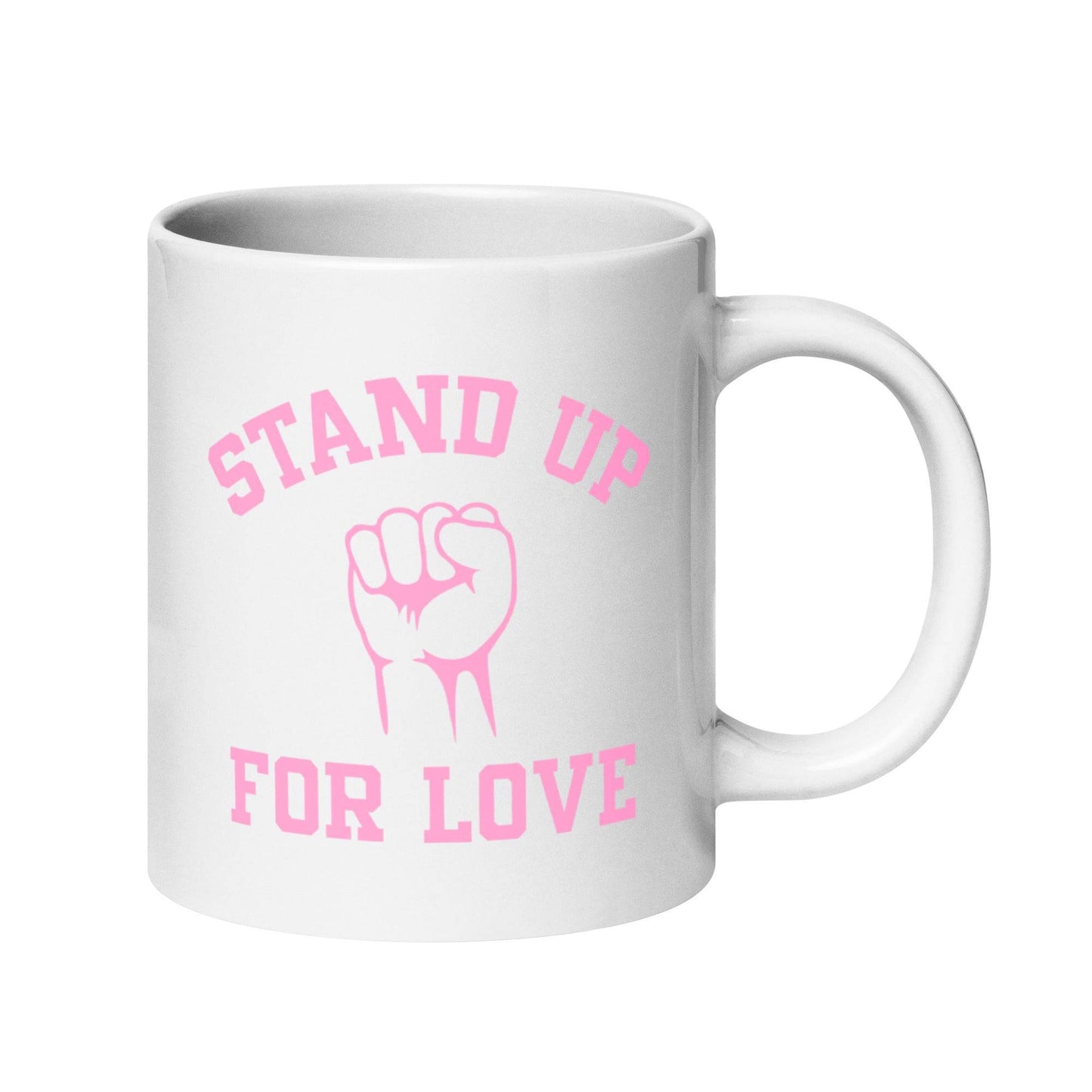 The "Stand Up For Love" mug from Pridelity features pink text on a white background, reading "Stand Up for Love," with an image of a raised fist between the words. As part of the Pride Collections 2025, it symbolizes unity and love.