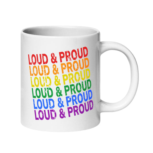 The Loud & Proud Mug by Pridelity, part of the Pride Collection 2025, is a white mug featuring "Loud & Proud" repeated seven times in a vertical rainbow pattern: red, orange, yellow, green, blue, indigo, and violet.